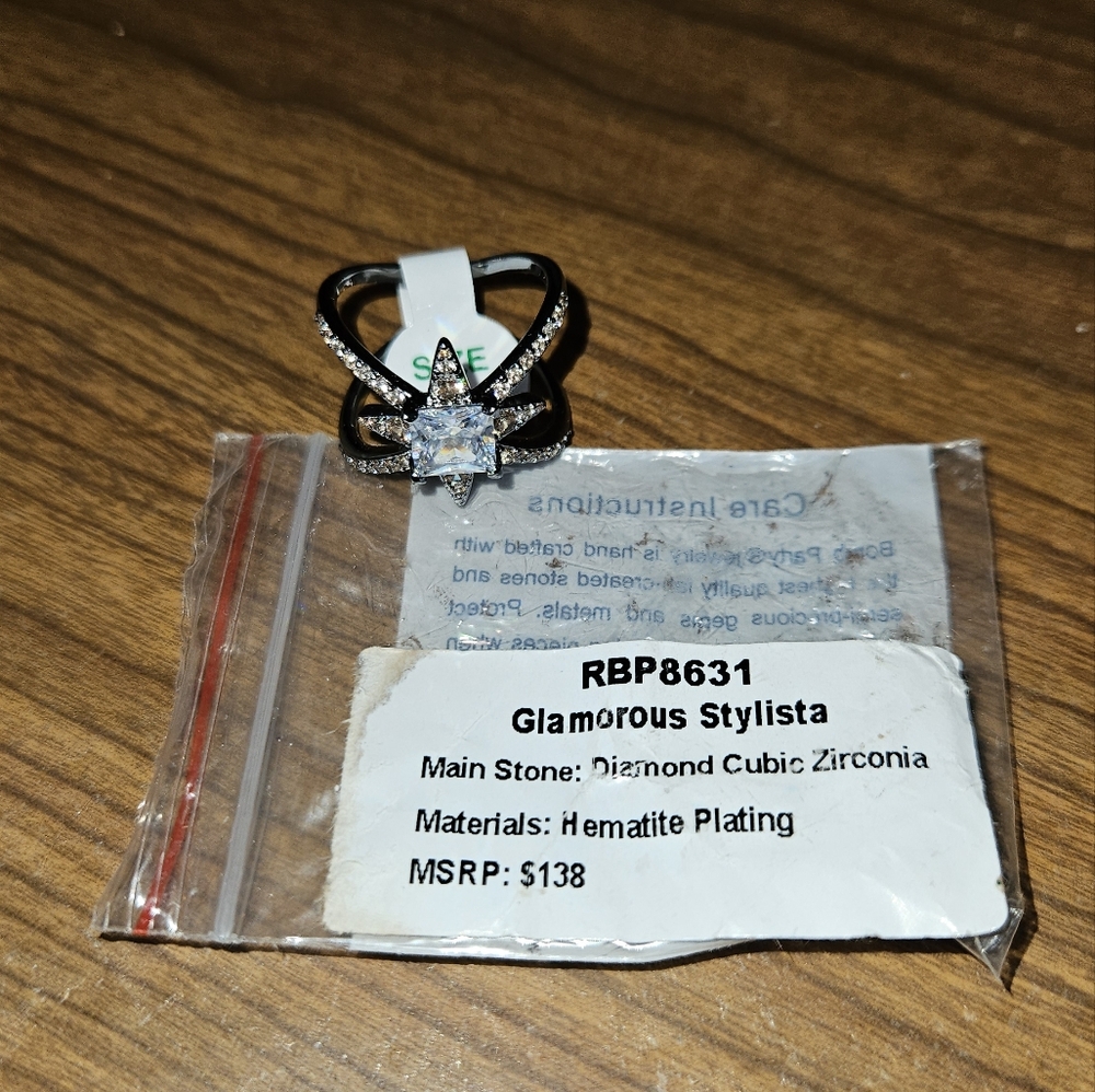Bomb Party Diamond Cubic Zircornia Ring With Hemitite Plating.